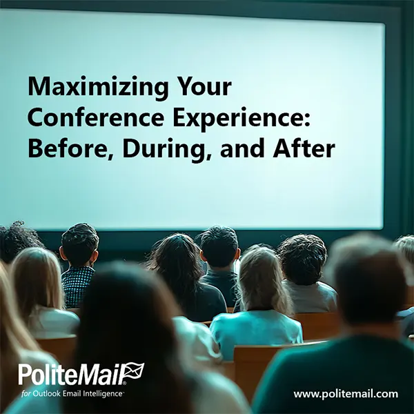 A conference hall with an audience looking at a screen that says 'maximizing your conference experience befor during and after'